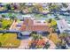Single-story home with waterfront access and boat dock at 1575 Brookside Blvd, Largo, FL 33770