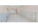 Spacious room with a unique glass block accent wall, ready for personalization at 1575 Brookside Blvd, Largo, FL 33770