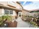 Neat front yard with walkway leading to the entrance at 17546 Fairmeadow Dr, Tampa, FL 33647