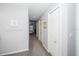 Bright hallway with access to bedrooms and closets at 17546 Fairmeadow Dr, Tampa, FL 33647