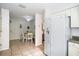 Kitchen with breakfast nook and white appliances at 17546 Fairmeadow Dr, Tampa, FL 33647