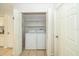 Laundry closet with washer and dryer at 17546 Fairmeadow Dr, Tampa, FL 33647
