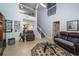 Open and airy living room with high ceilings and plenty of natural light at 17546 Fairmeadow Dr, Tampa, FL 33647