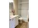 Updated bathroom with a tub, shower, and white cabinets at 1799 N Highland Ave # 44, Clearwater, FL 33755