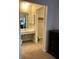 Simple bathroom with vanity, mirror, and closet at 1799 N Highland Ave # 44, Clearwater, FL 33755