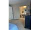 Bright bedroom with ensuite bathroom access and ample closet space at 1799 N Highland Ave # 44, Clearwater, FL 33755