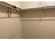 Spacious closet with a double hanging rod and shelving for storage at 1799 N Highland Ave # 44, Clearwater, FL 33755