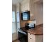 Updated kitchen with stainless steel appliances and granite countertops at 1799 N Highland Ave # 44, Clearwater, FL 33755