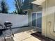 Private patio with grill and sliding glass door access at 1799 N Highland Ave # 44, Clearwater, FL 33755