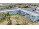 Aerial view of a light green building complex at 2043 Denmark St # 65, Clearwater, FL 33763