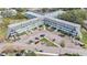 Aerial view of building complex and parking lot at 2043 Denmark St # 65, Clearwater, FL 33763