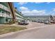 Exterior view of a building with parking at 2043 Denmark St # 65, Clearwater, FL 33763