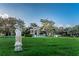 Landscaped grounds with a statue and a gazebo at 2043 Denmark St # 65, Clearwater, FL 33763