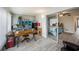 Bright home office with a view of the bedroom and a sliding glass door at 2043 Denmark St # 65, Clearwater, FL 33763