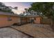 Backyard with gravel patio and small deck at 2201 Park N St, St Petersburg, FL 33710