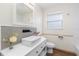 Modern bathroom with updated vanity, vessel sink, and new flooring at 2201 Park N St, St Petersburg, FL 33710