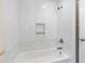 Updated bathroom with white subway tile and a shower/tub combo at 2201 Park N St, St Petersburg, FL 33710
