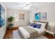 Bedroom with hardwood floors and a ceiling fan at 2201 Park N St, St Petersburg, FL 33710