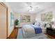 Spacious bedroom with hardwood floors and ceiling fan at 2201 Park N St, St Petersburg, FL 33710