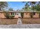 Orange house with a red brick walkway at 2201 Park N St, St Petersburg, FL 33710