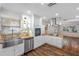 Modern kitchen with island, stainless steel appliances, and wood flooring at 2201 Park N St, St Petersburg, FL 33710
