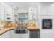Updated kitchen, featuring a farmhouse sink and butcher block countertops at 2201 Park N St, St Petersburg, FL 33710