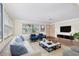 Bright and airy living room with hardwood floors and comfortable seating at 2201 Park N St, St Petersburg, FL 33710