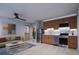 Modern kitchen with stainless steel appliances and light wood cabinets at 2550 1St N Ave, St Petersburg, FL 33713