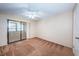 Bedroom with sliding glass doors to a lanai at 2587 Countryside Blvd # 6303, Clearwater, FL 33761