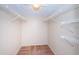 Large walk-in closet with wire shelving at 2587 Countryside Blvd # 6303, Clearwater, FL 33761