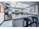 Community kitchen with stainless steel appliances at 2587 Countryside Blvd # 6303, Clearwater, FL 33761