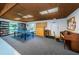 Community game room with ping pong table and book shelves at 2587 Countryside Blvd # 6303, Clearwater, FL 33761