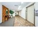 Condo hallway with elevator and wood accent wall at 2587 Countryside Blvd # 6303, Clearwater, FL 33761