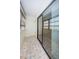 Spacious lanai with tile flooring and sliding doors at 2587 Countryside Blvd # 6303, Clearwater, FL 33761