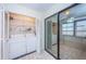 Laundry room features washer, dryer, and extra shelving at 2587 Countryside Blvd # 6303, Clearwater, FL 33761