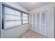Laundry room with washer, dryer, and shelving at 2587 Countryside Blvd # 6303, Clearwater, FL 33761