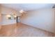 Light and airy living room with high ceilings and wood floors at 2587 Countryside Blvd # 6303, Clearwater, FL 33761