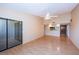Spacious living room with wood floors and access to a patio at 2587 Countryside Blvd # 6303, Clearwater, FL 33761