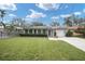 Ranch-style home with a large front yard and fence at 266 Snell Isle Ne Blvd, St Petersburg, FL 33704