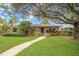 Single-story home with landscaped yard and walkway at 266 Snell Isle Ne Blvd, St Petersburg, FL 33704