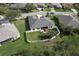 House with fenced backyard, hot tub, and surrounding homes at 3019 124Th E Ave, Parrish, FL 34219