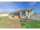 Spacious backyard with hot tub, play area, and privacy fence at 3019 124Th E Ave, Parrish, FL 34219