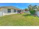 Large backyard with a hot tub, playset and privacy fence at 3019 124Th E Ave, Parrish, FL 34219
