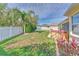 Private backyard with a hot tub and a wooden fence at 3019 124Th E Ave, Parrish, FL 34219