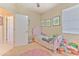 Cozy bedroom with a twin bed and plenty of storage at 3019 124Th E Ave, Parrish, FL 34219