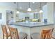 Kitchen boasts a breakfast bar and ample cabinetry at 3019 124Th E Ave, Parrish, FL 34219