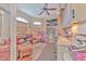 Bright playroom features built-in desk and seating at 3019 124Th E Ave, Parrish, FL 34219