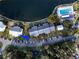Aerial view showing property location and community amenities at 3141 Lake Pine Way # D2, Tarpon Springs, FL 34688