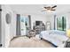 Bright bedroom with a comfy bed and plenty of natural light at 3141 Lake Pine Way # D2, Tarpon Springs, FL 34688