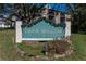 Deer Hollow community entrance sign at 3141 Lake Pine Way # D2, Tarpon Springs, FL 34688